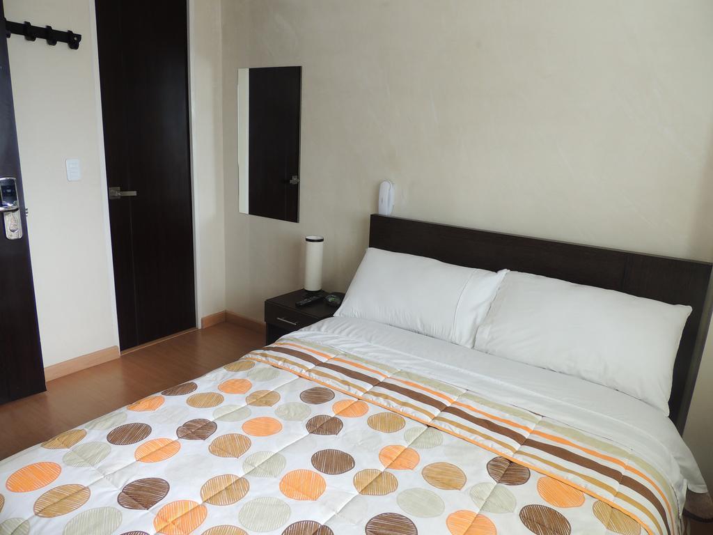 Titan Hotel & Spa Bogotá Rum bild
